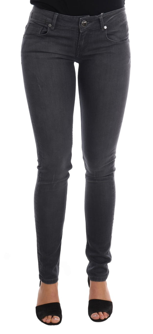 Sleek gray slim-fit Acht designer jeans with classic button fly