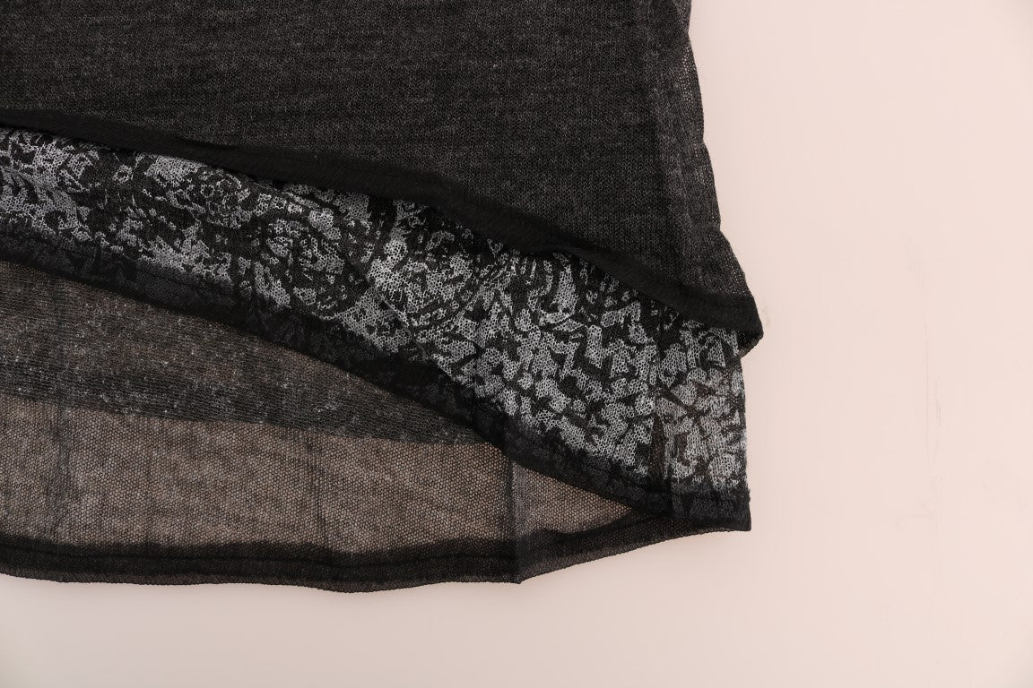  Gray blouse featuring alluring transparent sleeves and lace details 