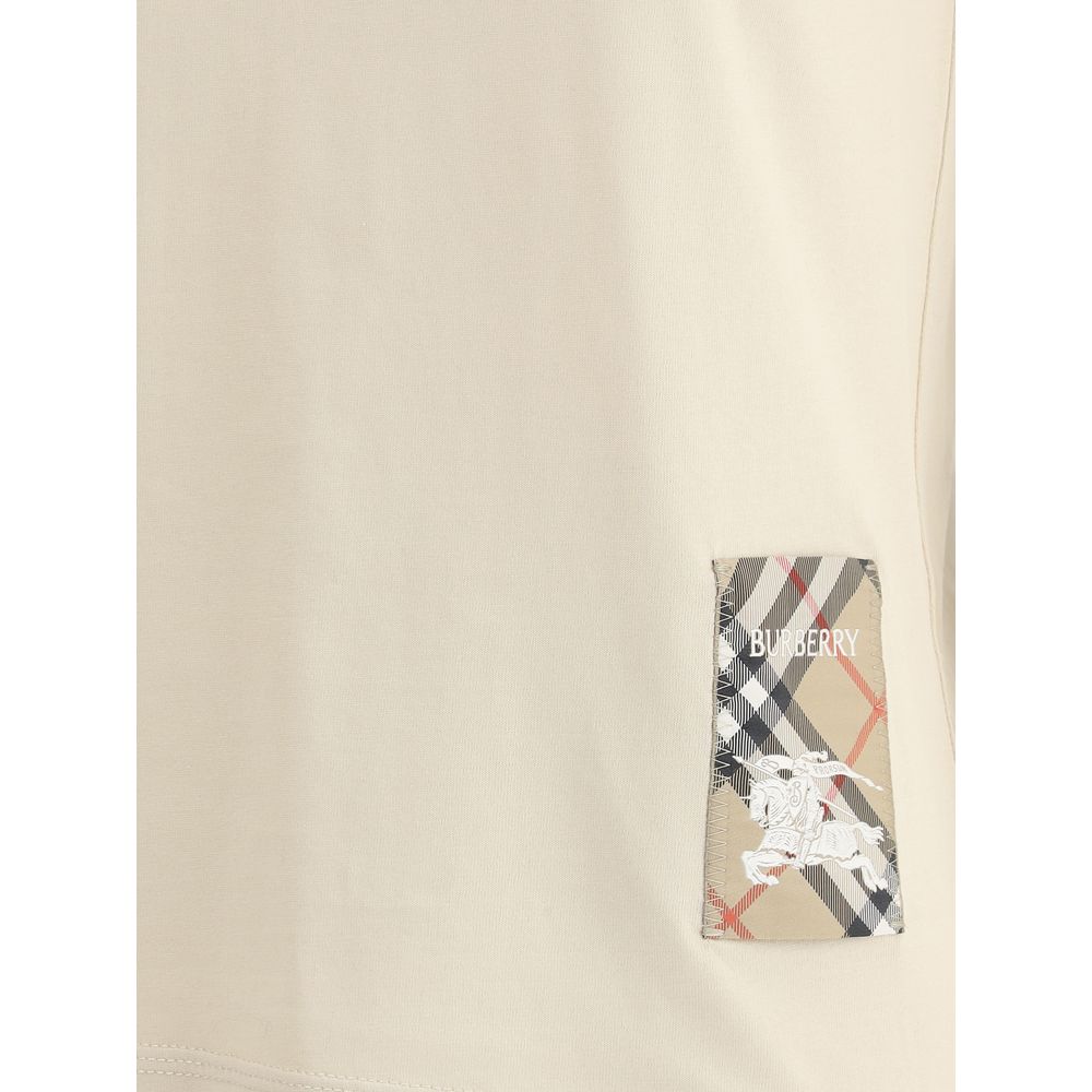 Burberry T-shirt featuring iconic logo patch and elegant design