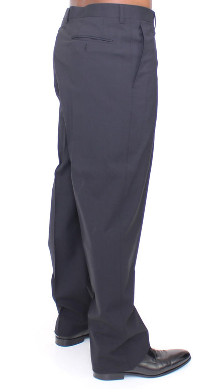 Sophisticated and tailored black wool trousers from Italy