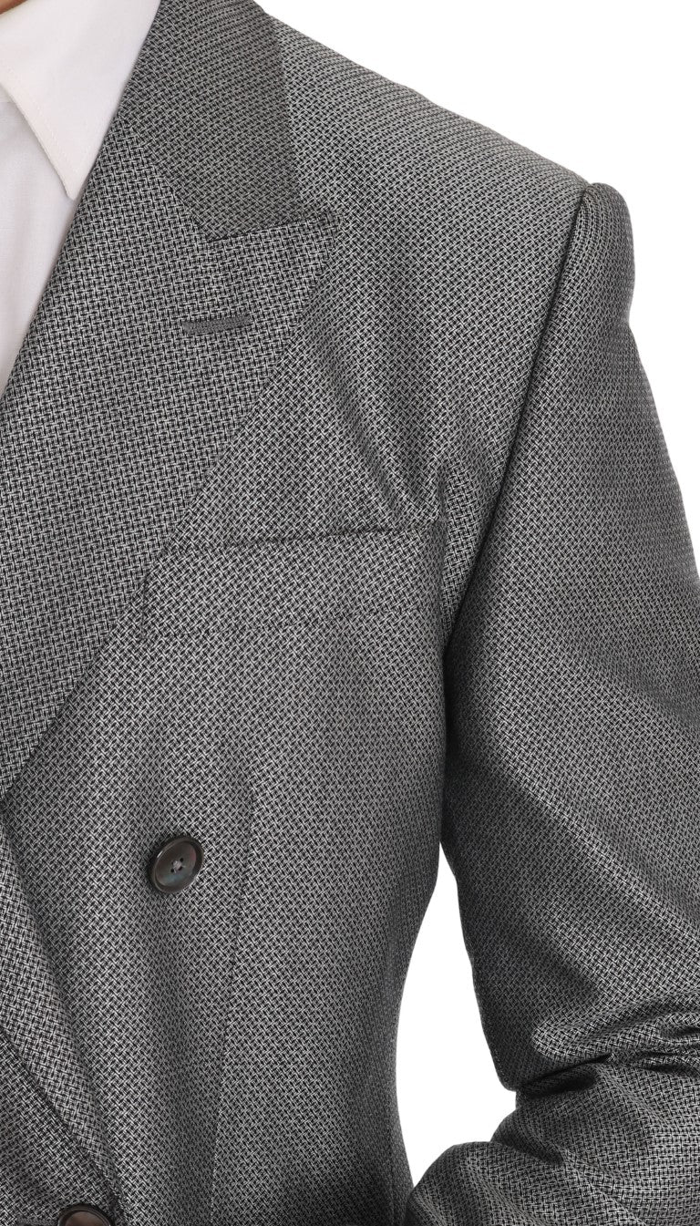 High-quality black double-breasted suit from Dolce & Gabbana, featuring a crystal bee embroidery for a touch of luxury
