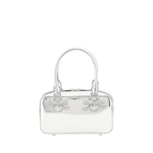 Elegant leather handbag with tubular handles and double-slider zipper closure