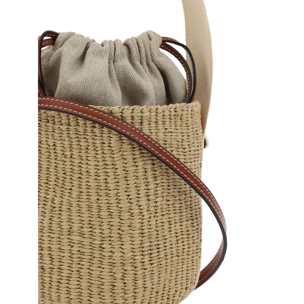 Leather welt pocket with press-stamped brand logo and raffia design