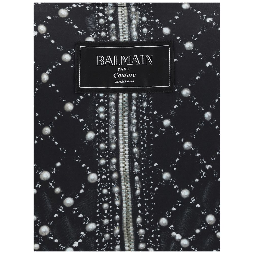 Elegant and sophisticated top with Balmain Couture fabric label