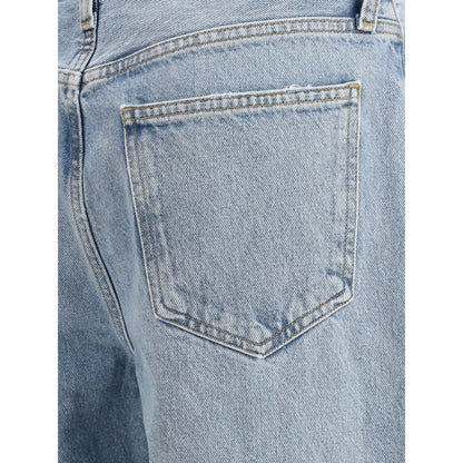 Functional five-pocket design with front zipper and button closure