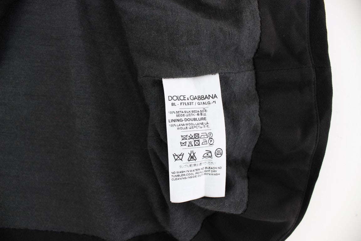 Exclusive Italian-made silk blouse with subtle opulence of logo details