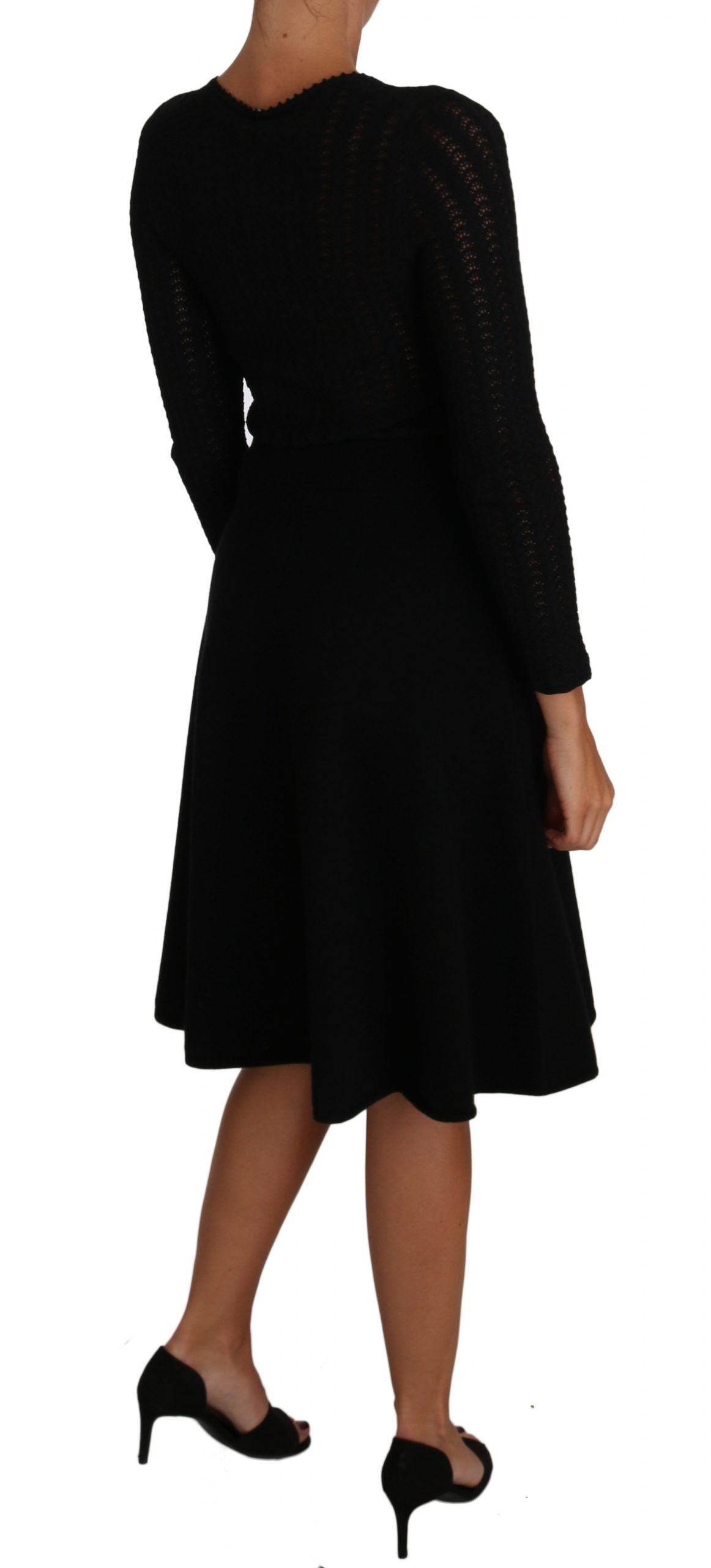 Long sleeve, black dress perfect for sophisticated events