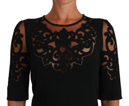 Black dress with unique pattern and logo details for exclusive look