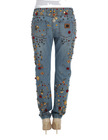 Luxurious light blue wash Dolce & Gabbana boyfriend jeans with meticulous gold and silver metal detailing