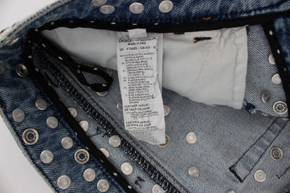 Italian-made Dolce & Gabbana boyfriend fit jeans with a light blue wash and enchanting crystal heart and rose embellishments