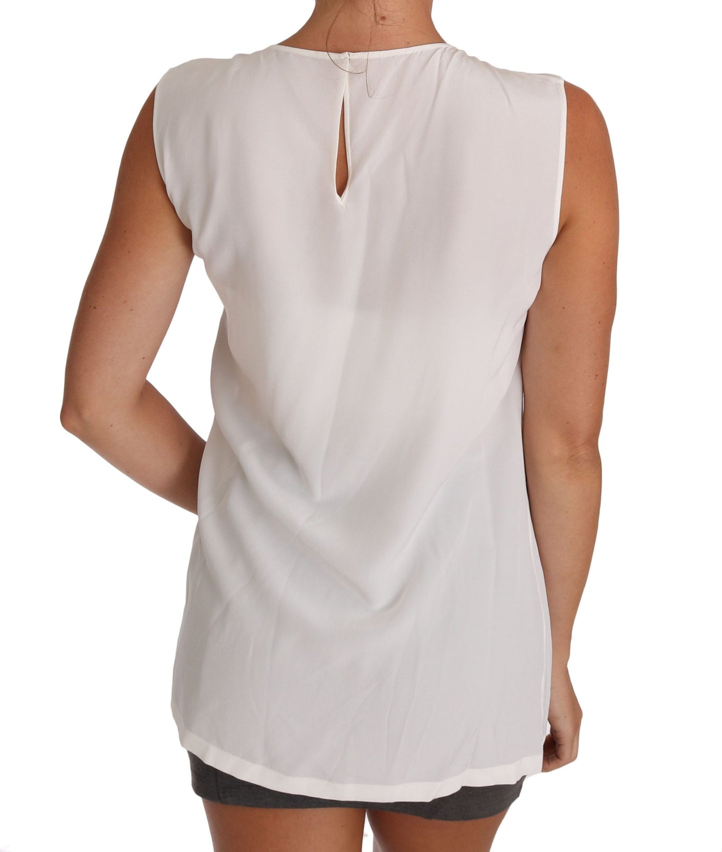 Exquisite Italian elegance in a white silk sleeveless top
