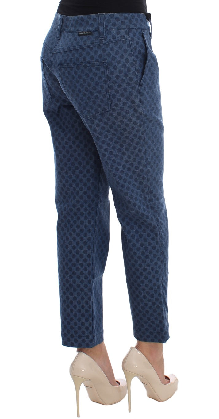 Chic and playful blue polka dotted capri pants with logo details