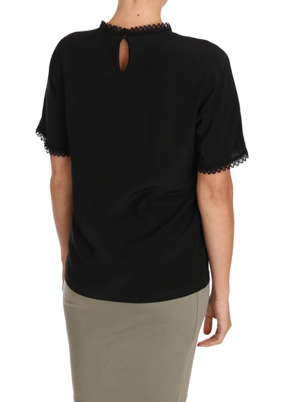 Luxurious 100% silk blouse with demure button closure