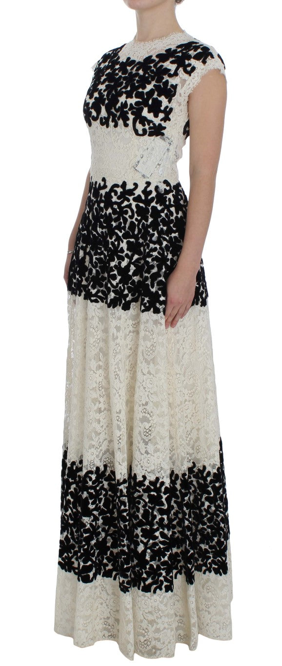 Luxurious full-length maxi dress with intricate black and white floral lace