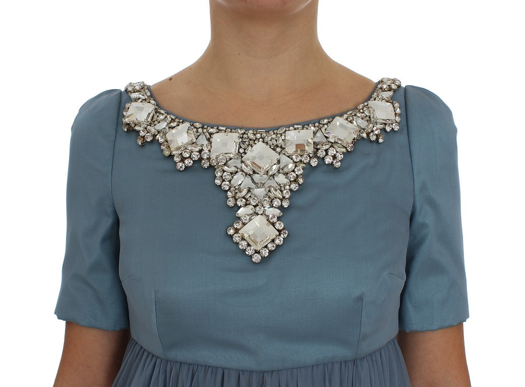 Sumptuous silk material complemented by dazzling crystal embellishments