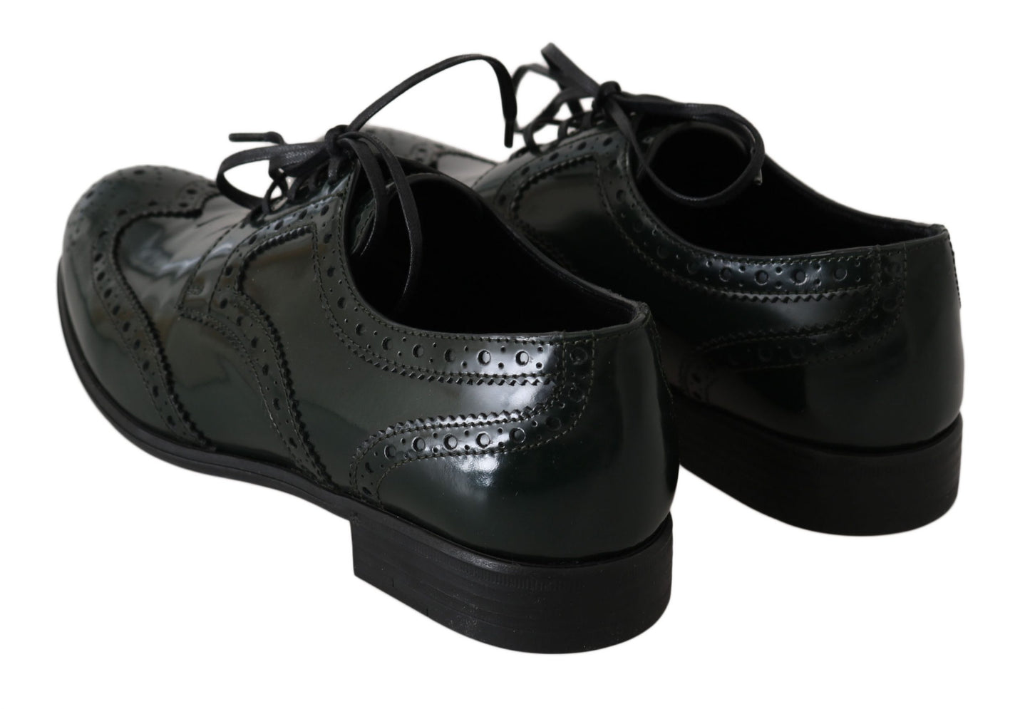 Step into sophistication with these elegant green brogues flats