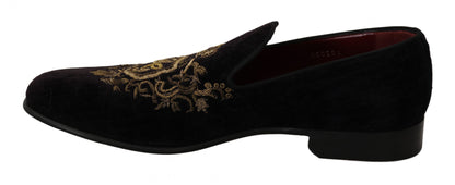 Timeless style and luxury in Dolce & Gabbana black loafers with gold crown