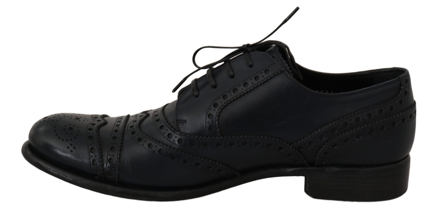 Blue leather wingtip derby shoes with Italian craftsmanship and logo details