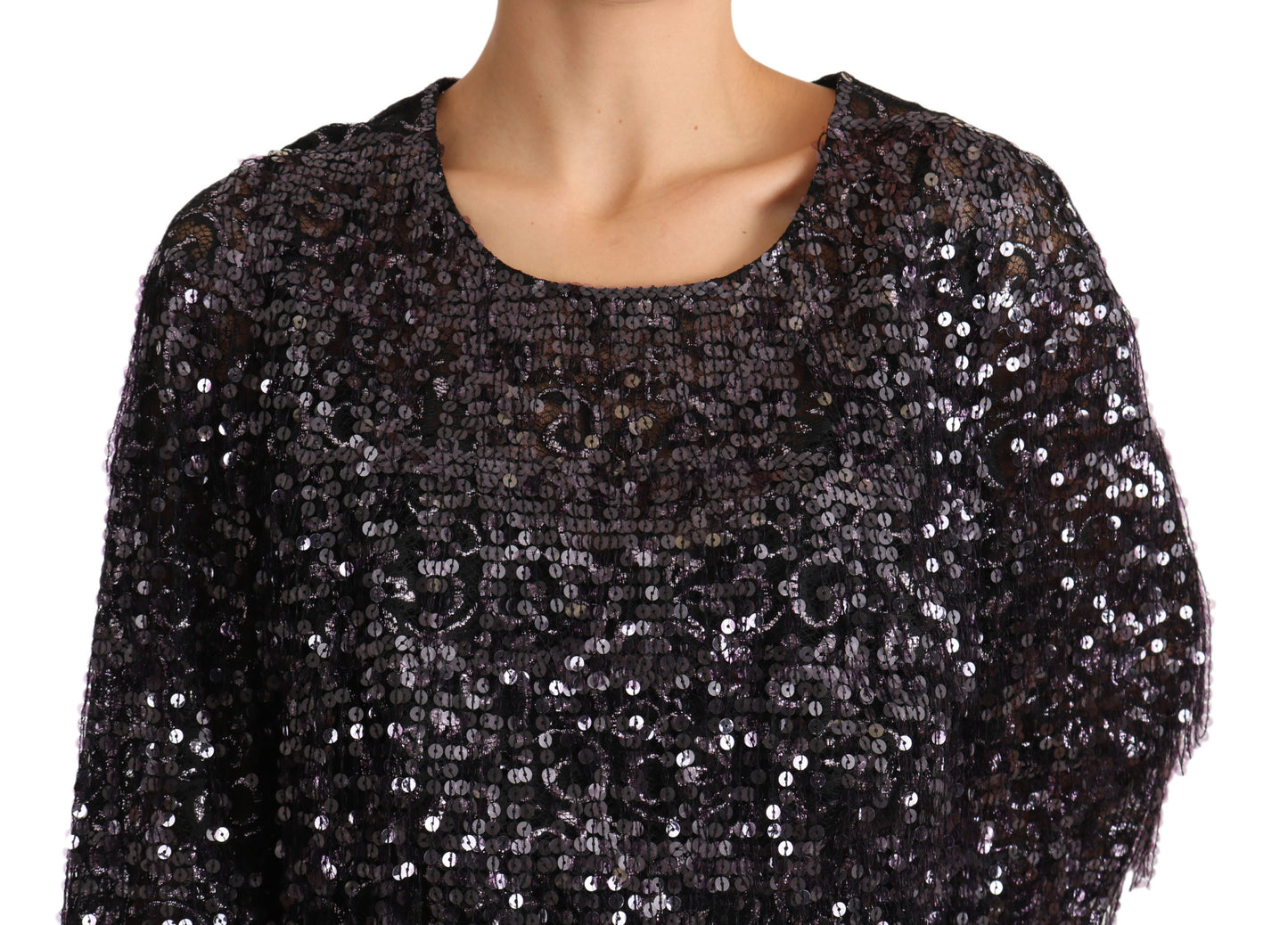Luxurious Italian-made black dress with refined elegance and artisan craftsmanship