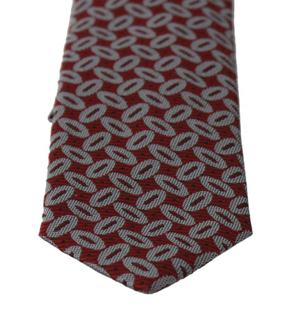 Luxurious 100% silk tie from Dolce & Gabbana in striking red print